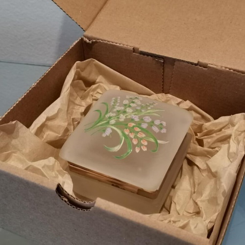 Glass vintage jewelry box used with floral decoration on lid