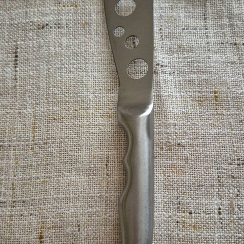 Cheese knife with perforated stainless steel blade like new