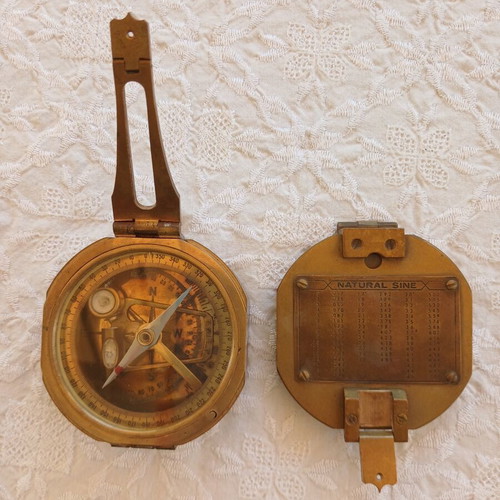 Vintage brass compass used with natural sine table
