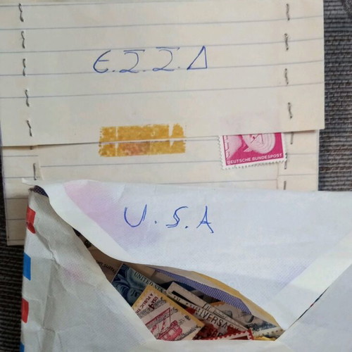 Stamps like new, collectible with two albums in storage box