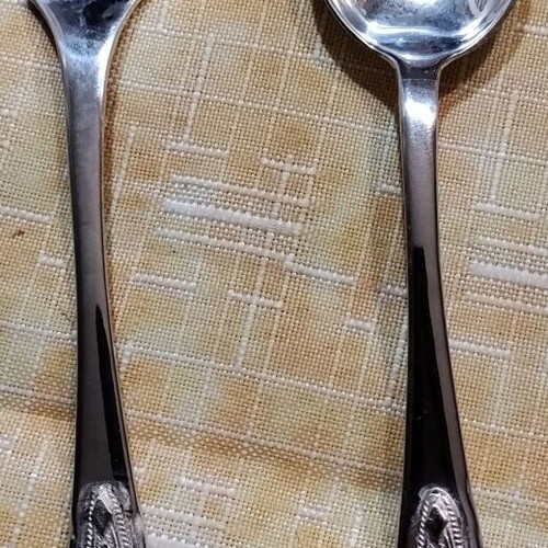 Vintage silver dessert spoons set with original case, used