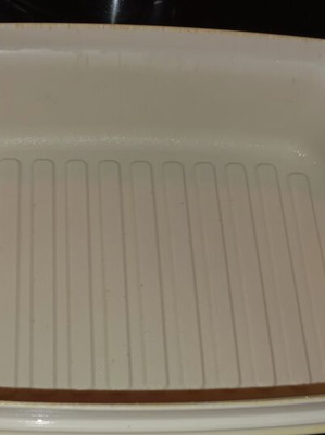 Tupperware cheese container used