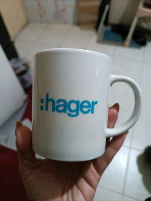 Ceramic mug Hager new, white with blue logo