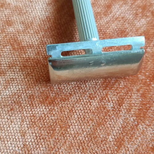 Vintage twist-to-open safety razor used