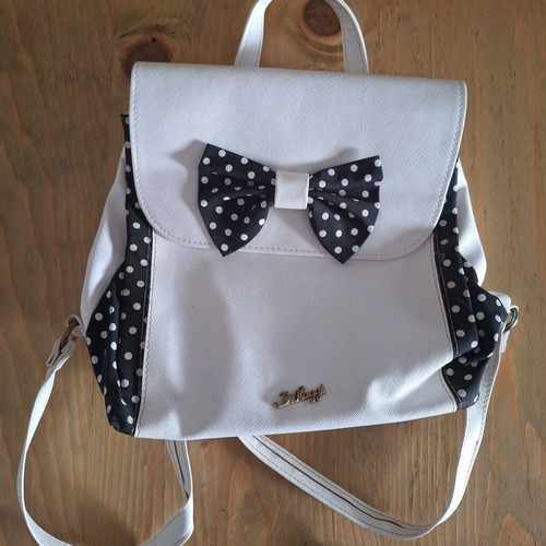D. Raggi backpack with bow and polka dot details, like new
