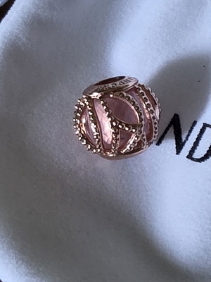 Pandora Intertwining Radiance charm with faceted pink stone, like new