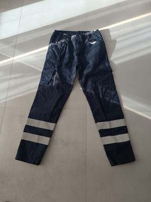 Work pants with reflective stripes