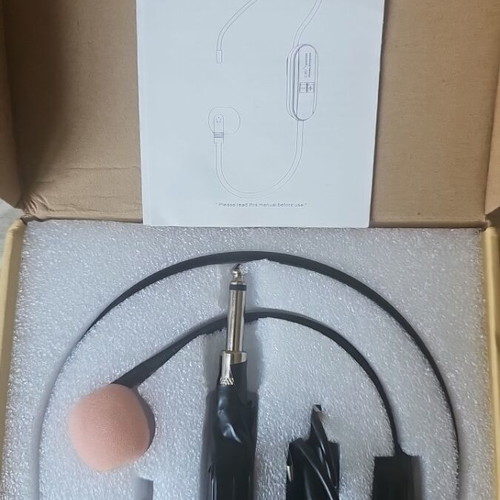 Wireless headset microphone used with 2x USB-C chargers