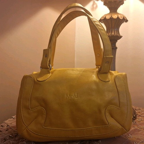 Women's mustard small hand bag used