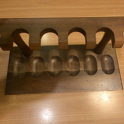Handmade wooden pipe stand used for six
