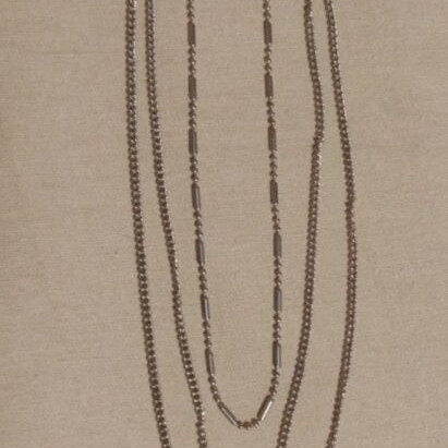 Triple Necklace new, silver color