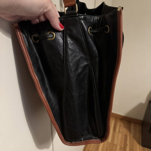 Bartuggi vintage leather shoulder bag black with brown details and gold buckle like new