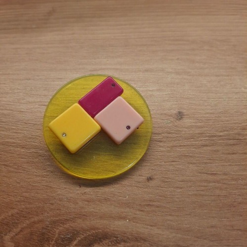 Plastic pin new, pink and yellow