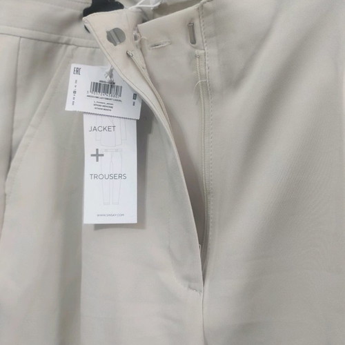 Ecru office pants medium new with box