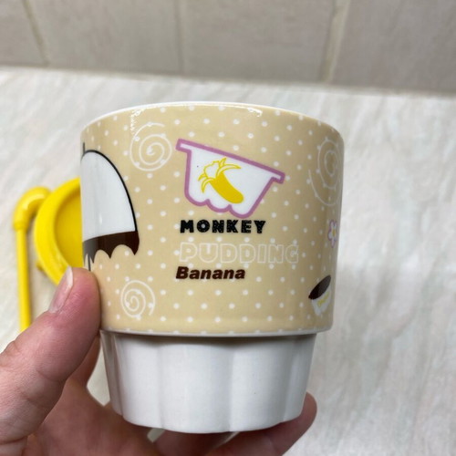 Ceramic mug new with plastic lid and spoon