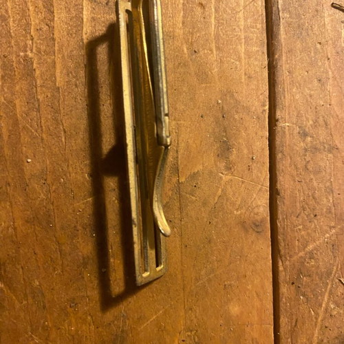 Metal tie clip used, gold color, 6 cm length