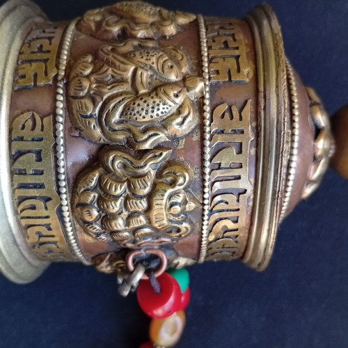 Tibetan prayer wheel used with original thin old paper
