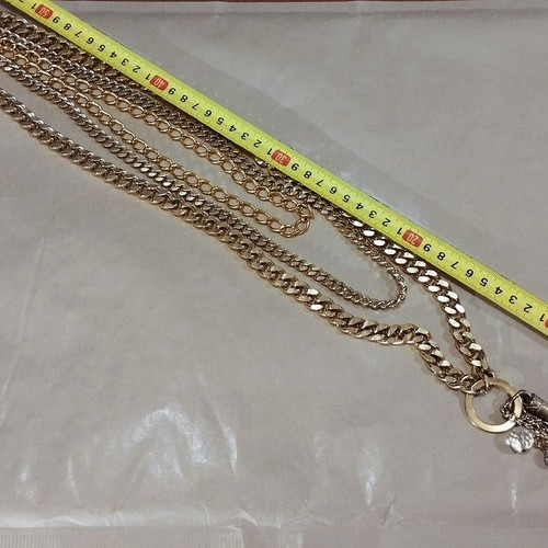 Triple chain with crystal charms like new, length 62 cm