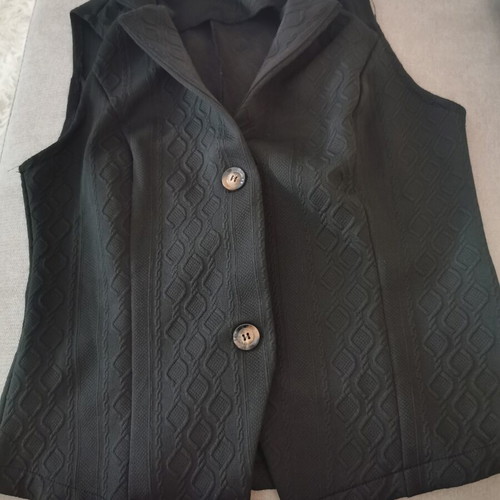 Vest black like new, size S fitting larger sizes