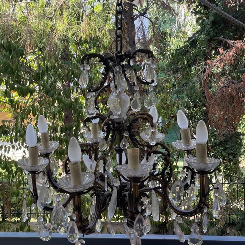Antique chandelier used with bronze and crystal