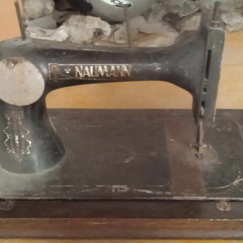 Naumann Hand Sewing Machine used on wooden antique base
