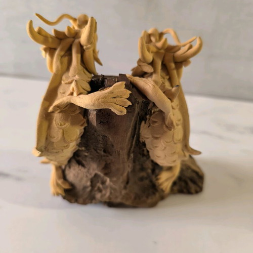 Wooden carved dragons used on wooden base
