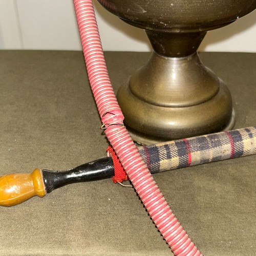Vintage brass decorative hookah with embossed designs, used