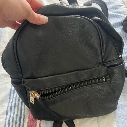 Backpack black used with 5 compartments