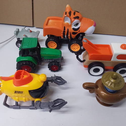 Children's toy set with submarine, cars, tractor, and magic lamp