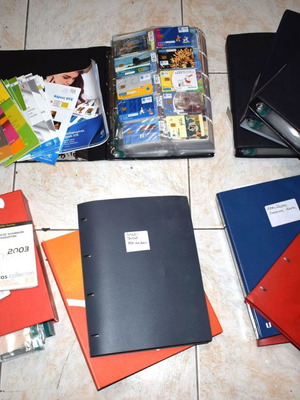 Collection of used 2307 phone cards with holders