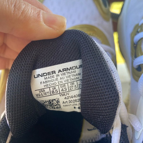 Under Armour athletic shoes like new, white with gold details size 43