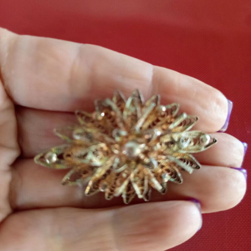 Vintage filigree sun brooch with pearls used