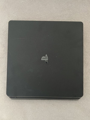 PlayStation 4 Slim 1TB σαν καινούργιο με 2 χειριστήρια DualShock 4 και βάση φόρτισης