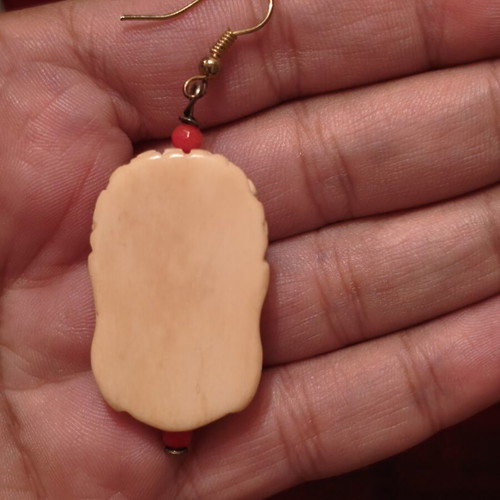 Vintage Laughing Buddha earrings, cream with red beads