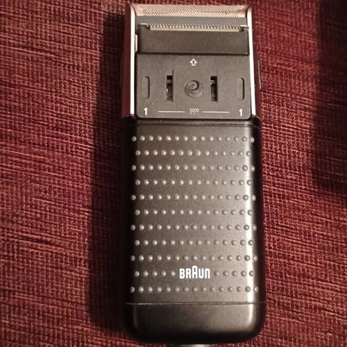 Vintage Braun electric shaver used with case and extra device