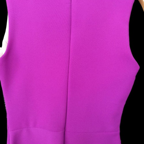 Cocktail dress new, elastic with embroidered details, size S