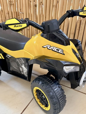 Yellow children's ride-on vehicle for 18-36 months