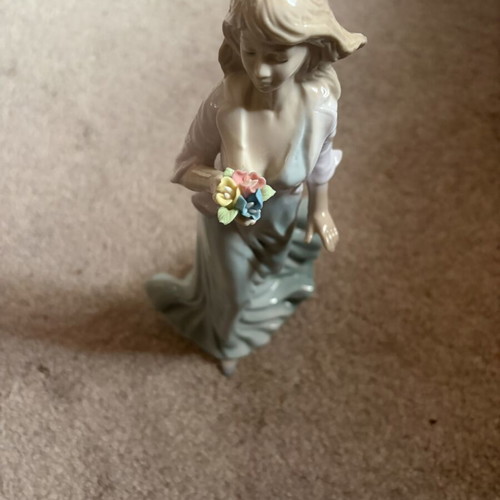 Porcelain figurine doll like new, height 25 cm