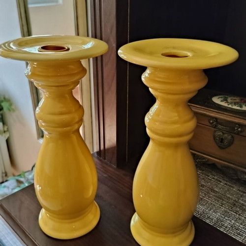 Set of two yellow ceramic candlesticks, 21 cm