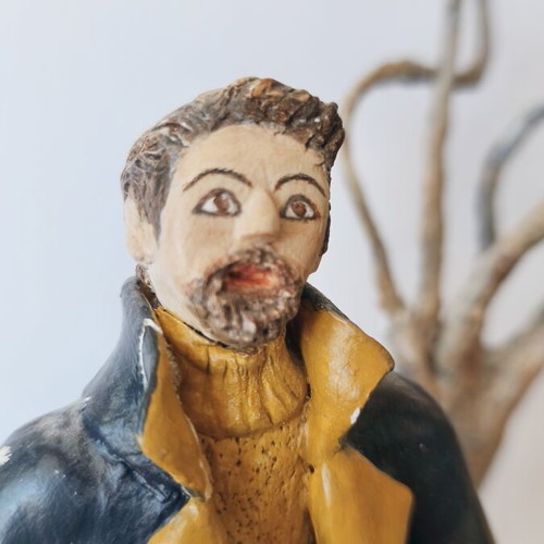 Handmade sculpture couple on globe by Nasia Soul