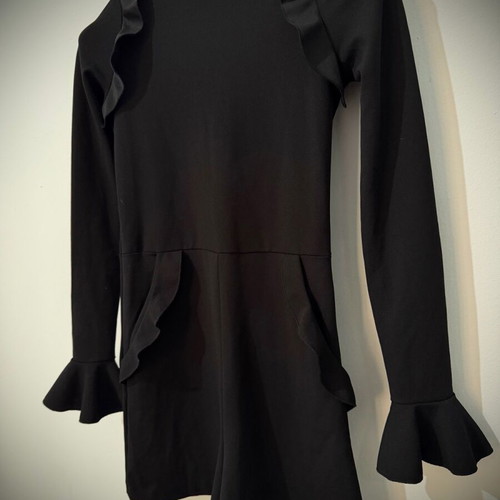 Zara one-piece shortsuit used, black with ruffles and open back