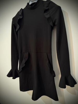 Zara one-piece shortsuit used, black with ruffles and open back