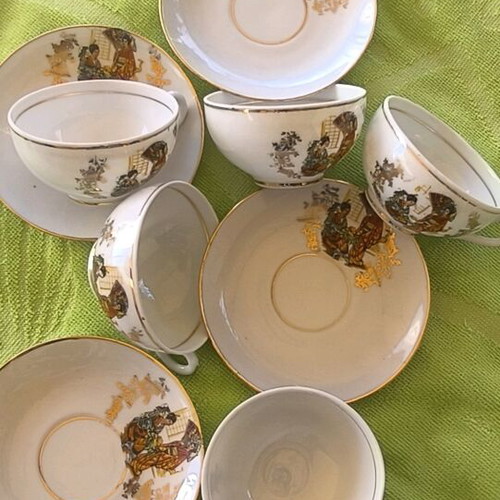 Kutani porcelain decorative cups with lithographs and gold trim used