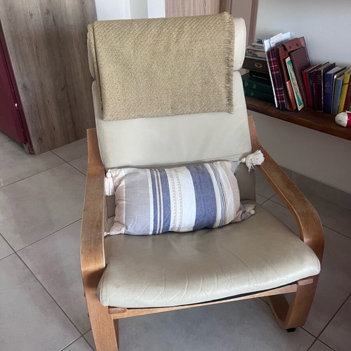 IKEA armchair used with beige leatherette cushion