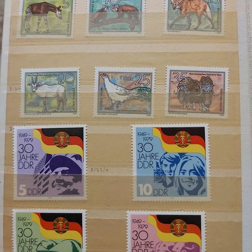 Mini album 16 pages like new with 36 unsealed series from East Germany