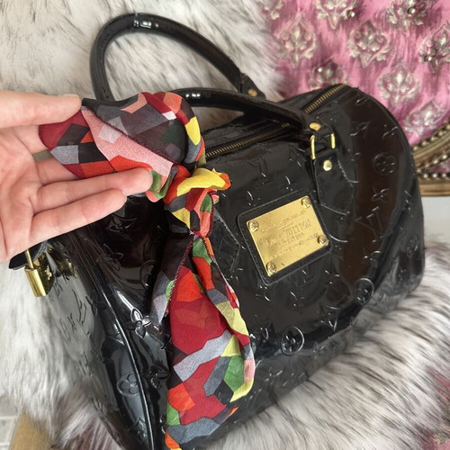 Louis Vuitton old black bag with gold accessories
