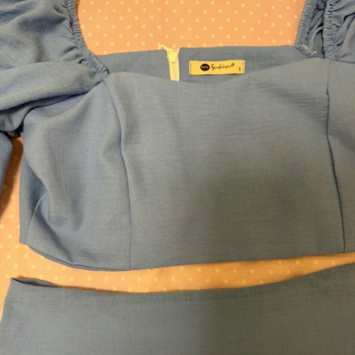 Set mini skirt and crop top turquoise, like new