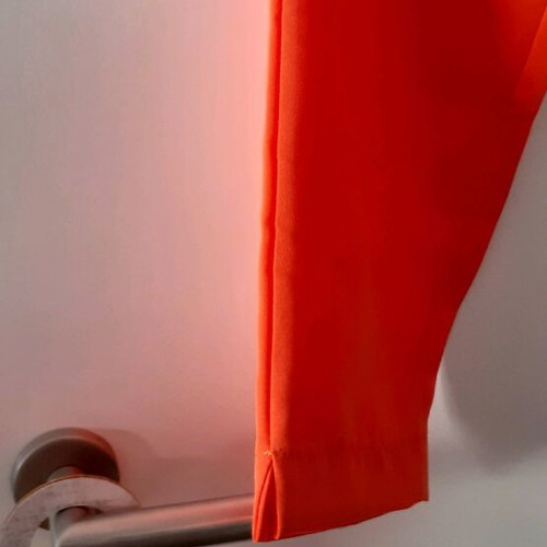Selestino orange pants size M like new with two front pockets