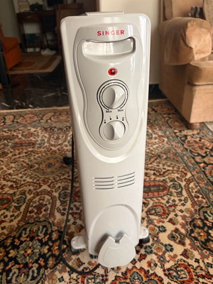 Ηλεκτρικό σώμα λαδιού Singer σαν καινούργιο
