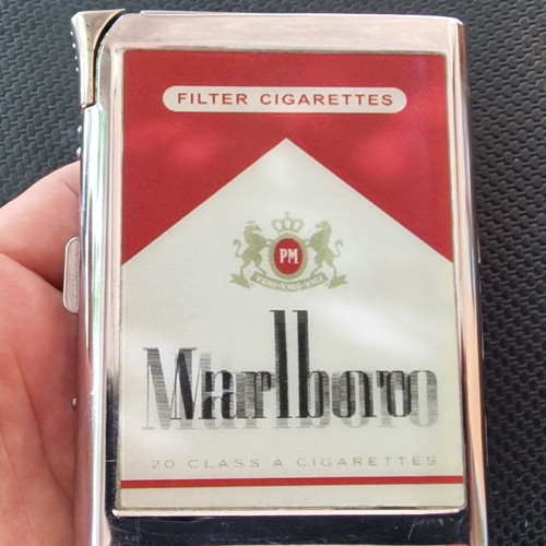 Marlboro collectible metal cigarette case with built-in lighter, like new